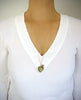 Long gold necklace with Olive Murano heart and Austrian crystal ball