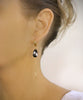 Dige Designs gold hoop earrings with black diamond Swarovski crystal drops