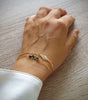 Gold double chain bracelet with black Swarovski crystals