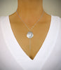 Medium-length rhodium plated seashell Y-necklace