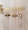 Gold dragonfly and leaf earrings with crystals