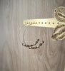 18K gold plated hoop earrings featuring Black Silver Night Swarovski crystals.
