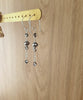 Rhodium plated dangle earrings handmade with "Black Silver Night" Swarovski crystals on display.