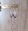 Rhodium plated heart filigree earrings with Black Silver Night Swarovski crystals on display