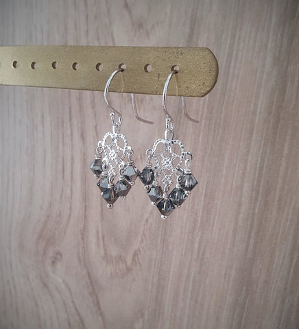 Rhodium plated heart filigree earrings with "Black Silver Night" Swarovski crystals