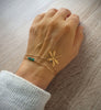 18K gold plated dragonfly bracelet handmade with sparkling Emerald Green crystals on hand.
