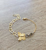 18K gold plated butterfly bracelet adorned with Black Silver Night Swarovski crystals.