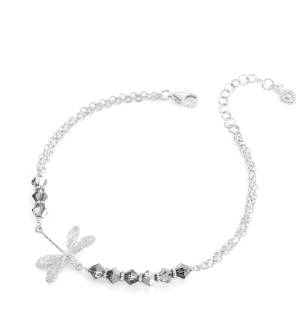 Silver dragonfly bracelet adorned with sparkling  Black Silver Night Swarovski crystals.