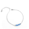 Silver chain bracelet adorned with sparkling Montana AB Swarovski crystals.