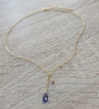 18K gold plated Y necklace featuring heart charm and Tanzanite Swarovski crystal drop.