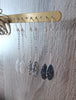 Silver dangle earrings with white, grey and Black Silver Night Swarovski crystal pavé pendants.