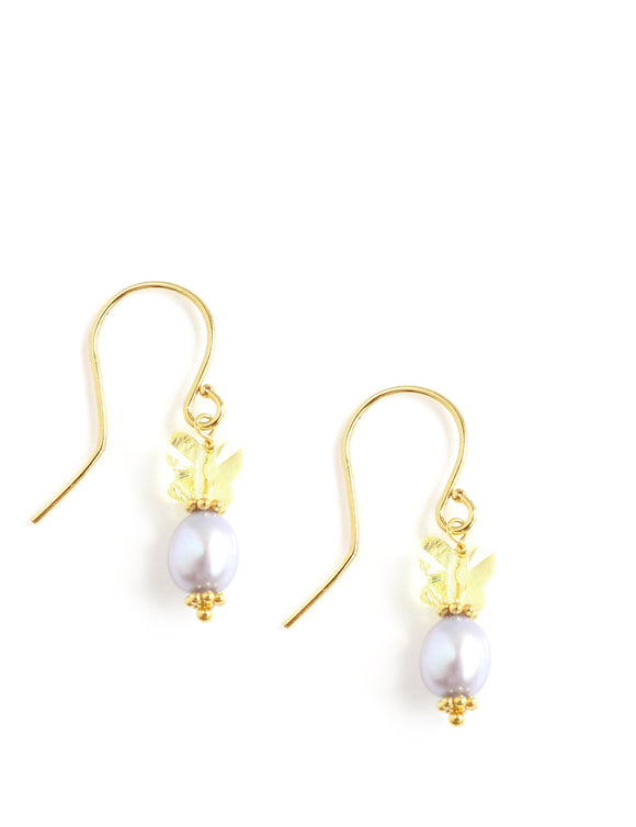 Dige Designs light blue pearl earrings with Swarovski butterfly crystals