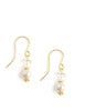 Dige Designs earrings with white freshwater pearl and Swarovski butterflies