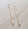 18K gold plated Long-length dangle earrings featuring Golden Shadow Swarovski crystals