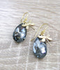 18K gold plated dragonfly earrings featuring "Black Silver Night" Swarovski crystal drops.